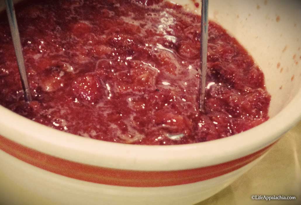 crushing-strawberries-for-jam